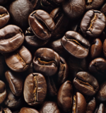 A close-up shot of roasted coffee beans