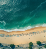 Aerial view of Ipanema beach with vibrant beachgoers, close to hotels in Ipanema, Rio de Janeiro