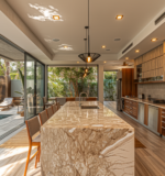 State-of-the-art gourmet kitchen in a Playa del Carmen luxury villa, featuring a spacious layout.