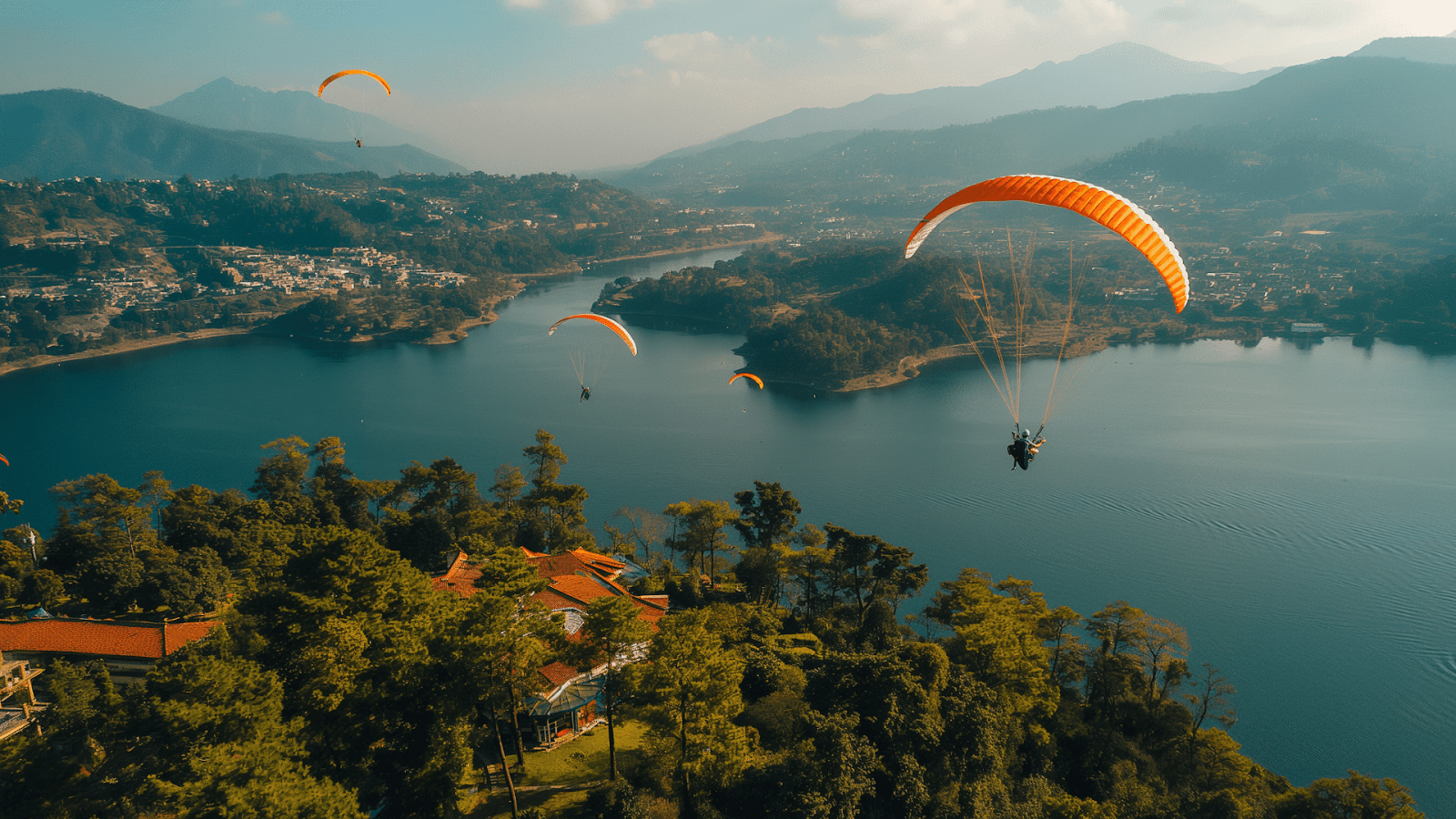 Paragliders soaring over a scenic lake near Mexico City, capturing the essence of adventure in the area