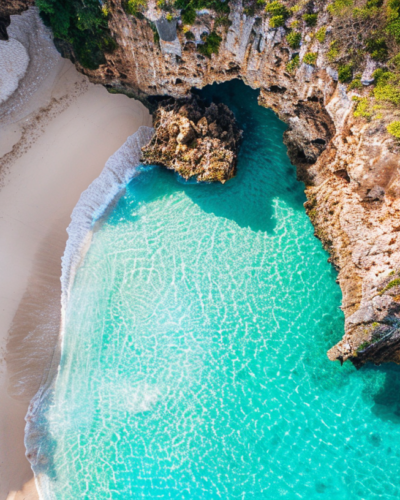 Aerial view of the Hidden Beach at Marietas Islands, featuring crystal clear waters and natural archways.